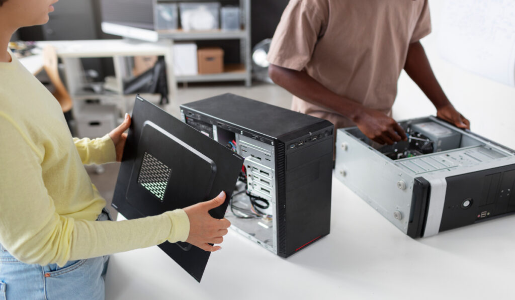 people repairing computer chips